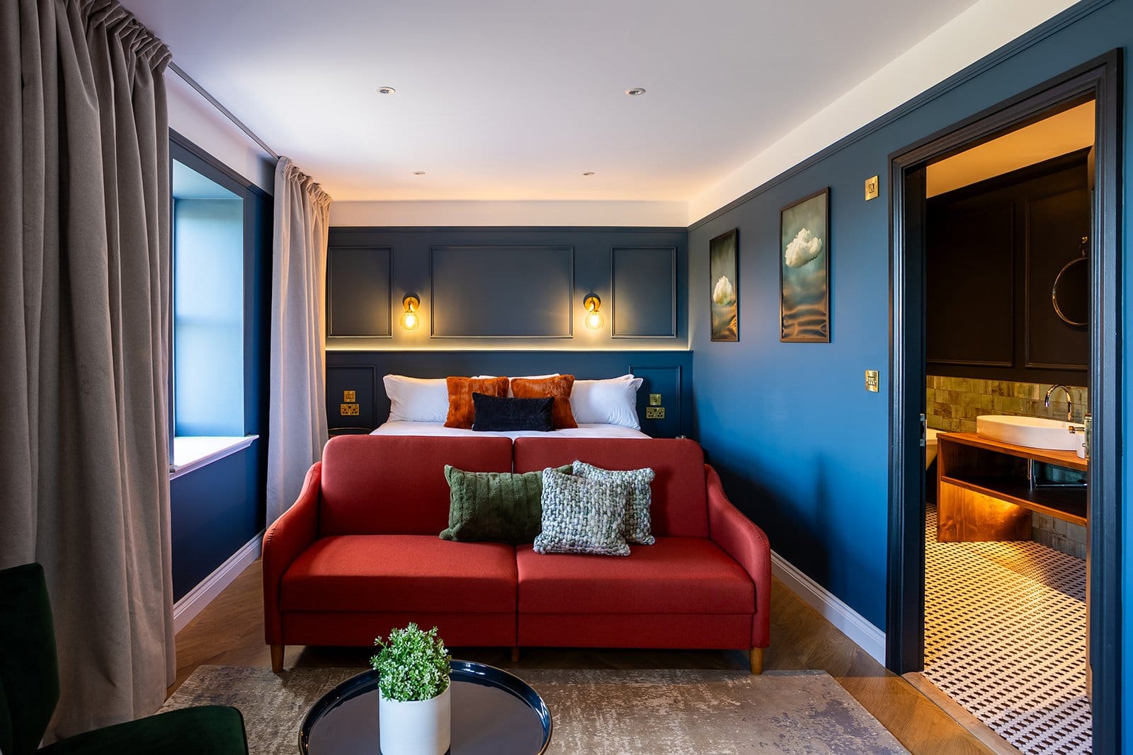 A stylish room showcasing a red couch