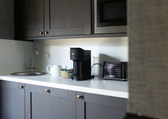 A modern kitchen featuring a coffee maker